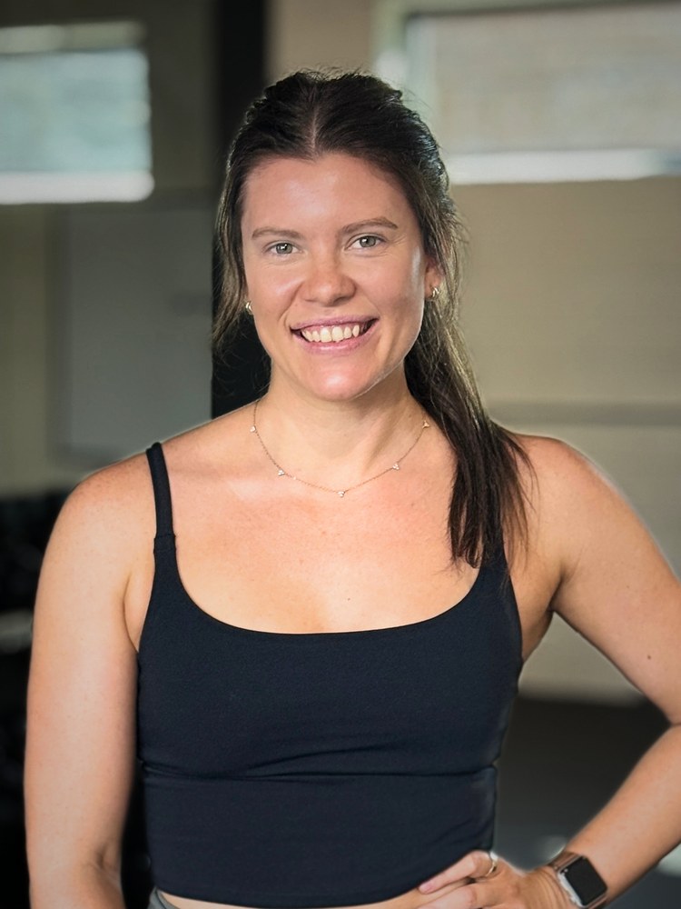 Coach Chloë Woest